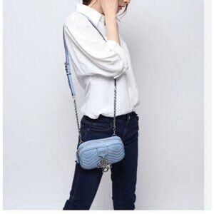 GUESS Violet quilted faux-leather small crossbody bag - Blue